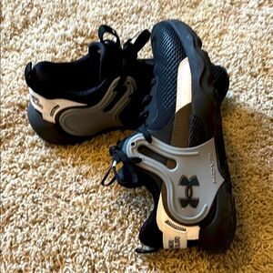 Under Armour Black and White Sneakers Rugged Design